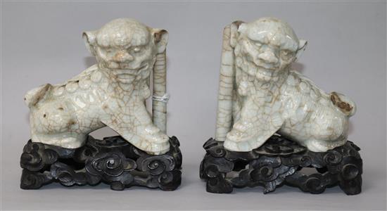 A pair of Chinese crackleglaze lion joss stick holders and stands H.11.5cm